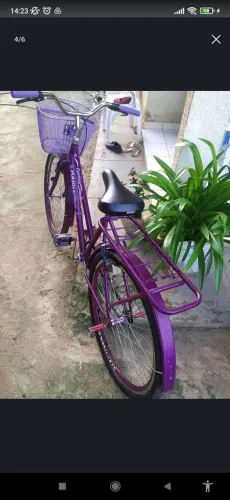 Bicicleta Cairu roxa com nota fiscal