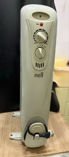 Aquecedor de ar NELL Aquecedor a Oleo Modelo NYM-7 1500W 127V