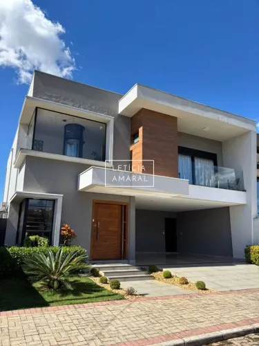 Casa com 5 dormitórios à venda, 330 m² por R$ 2.950.000,00 - Loteamento Belavilla I - Pous