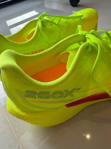Tênis de corrida com placa 260X o mais moderno Chinês 