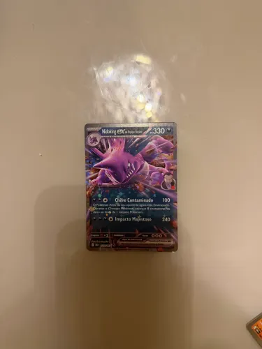 Nidoking ex da Equipe Rocket (119/182), da coleção rivais predestinados 