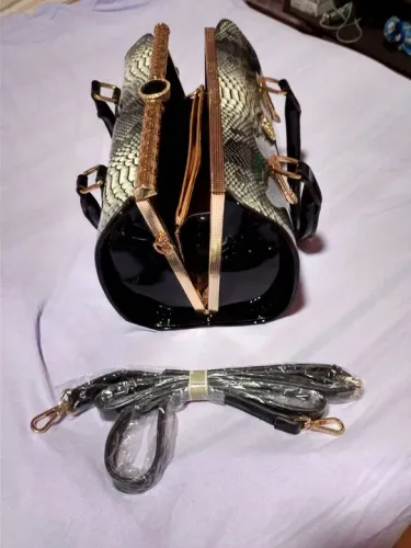 Bolsa de mão feminina em couro sintético 