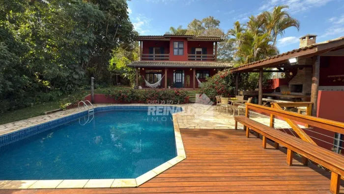 Casa com 3 dormitórios à venda, 370 m² por R$ 3.000.000,00 - Condomínio Cachoeiras do Imar