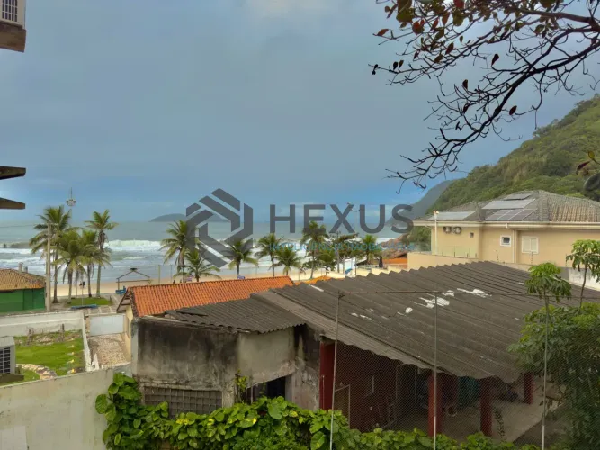 Apartamento frente mar com varanda vista mar no Tombo, Guarujá