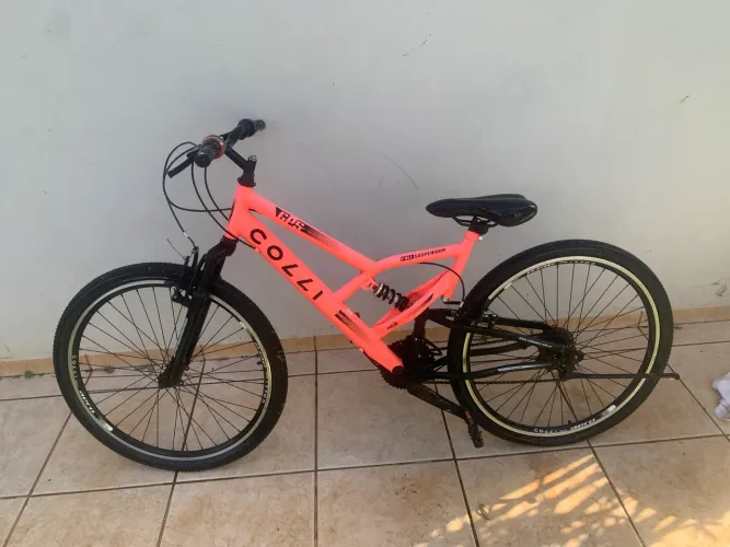 Bicicleta de mola aro 26 cor laranja marca colli