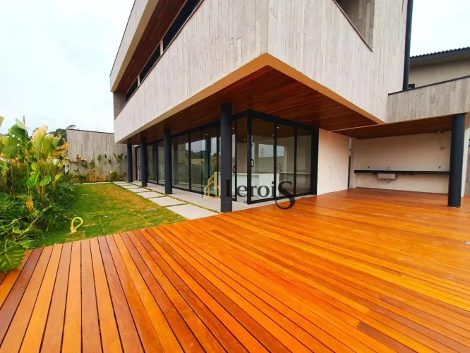 Casa com 4 dormitórios à venda, 340 m² por R$ 4.200.000,00 - Condomínio Villas do Golfe -