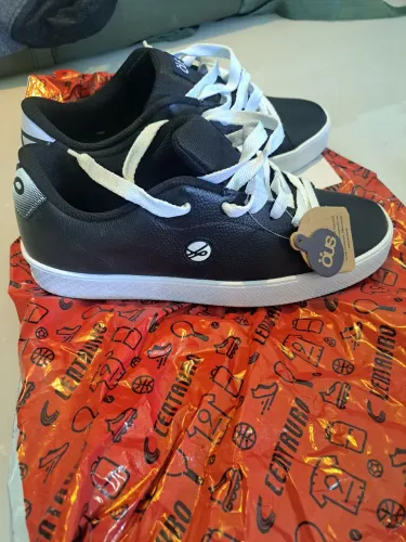 Tênis ous skate novo
