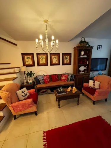 Casa à venda em Condomínio na Praia de Boiçucanga: 3 suítes, ótima infraestrutura e locali