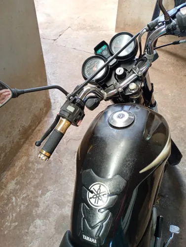 YBR pedal cor preta doc ok. Só hoje $6.990