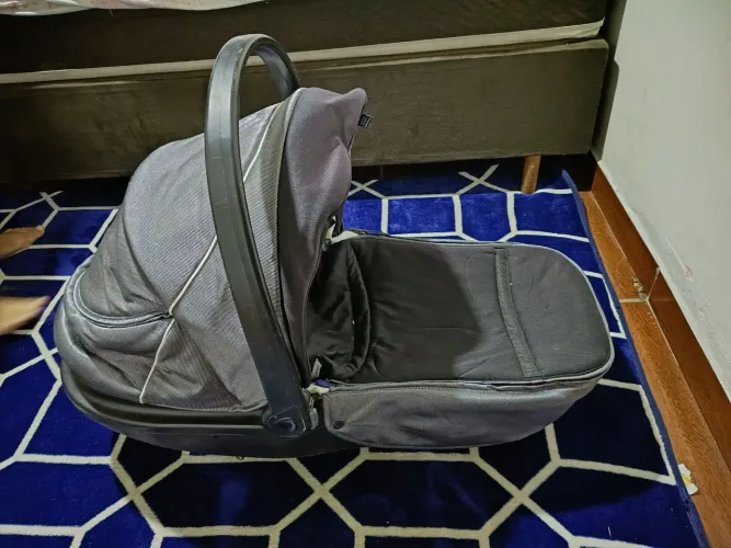 Moisés bebê conforto