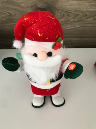 Brinquedo eletrônico de Papai Noel - Canta quatro músicas e anda (novo)