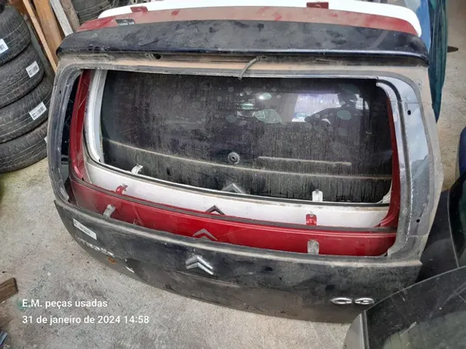 Tampa traseira C3 2010