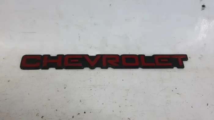Emblema Chevrolet vermelho tampa traseira GM Monza Kadett Ipanema