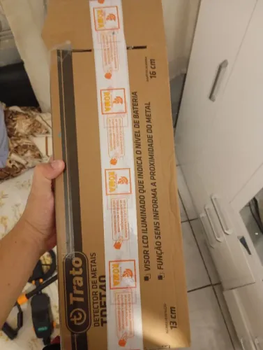 Detector de metal e retrovisor de moto