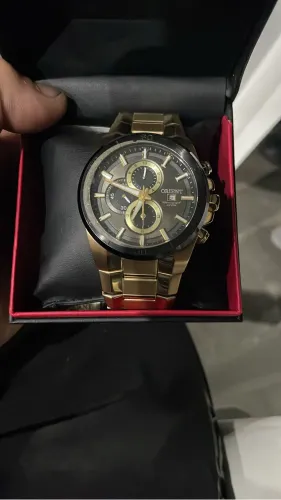 Relógio oriente pulseira banhada a ouro.