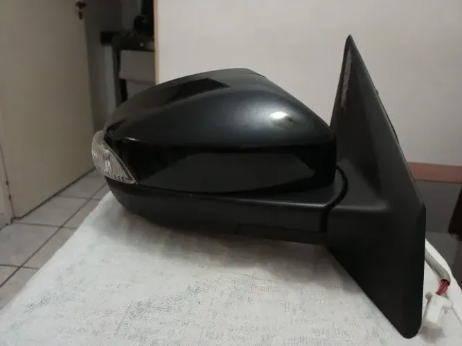 Retrovisor Versa Dir C/ pisca 2017 a 2020 detalhe.