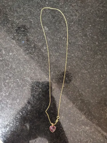 Corrente de ouro com pingente