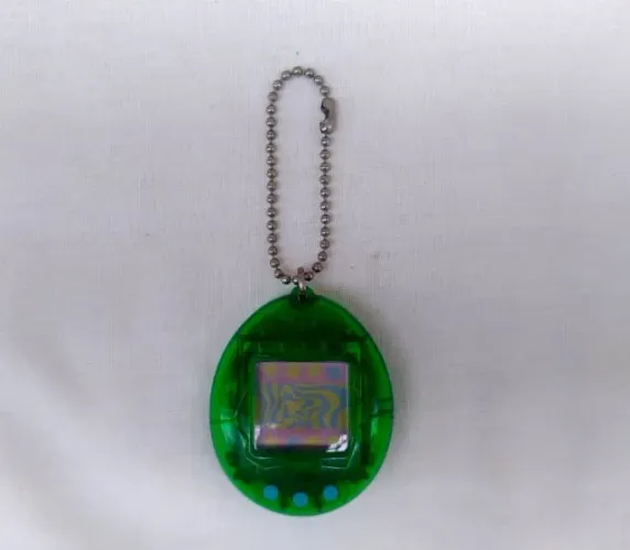 Bichinho Virtual Tamagotchi Bandai Original Verde Transparente Retrô Geração 1 P1 Anos 90