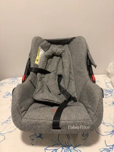 Bebê conforto com base fisher price