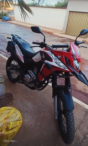 Honda XRE 300 rally , com baixo km rodados .