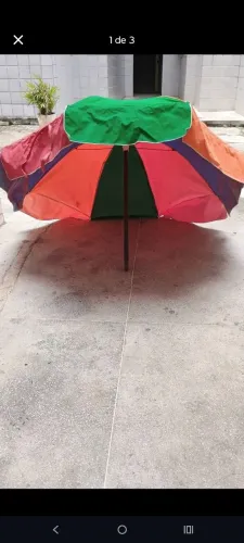 Vendo guarda sol de pau de madeira todo em ordem preço negociável