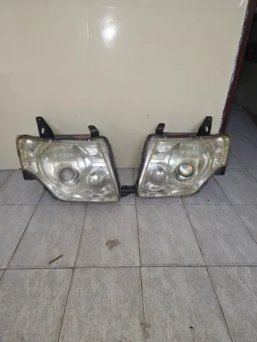 Par de farol Pajero full 2008 a 2019