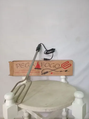 Acendedor de churrasqueira eletrico
