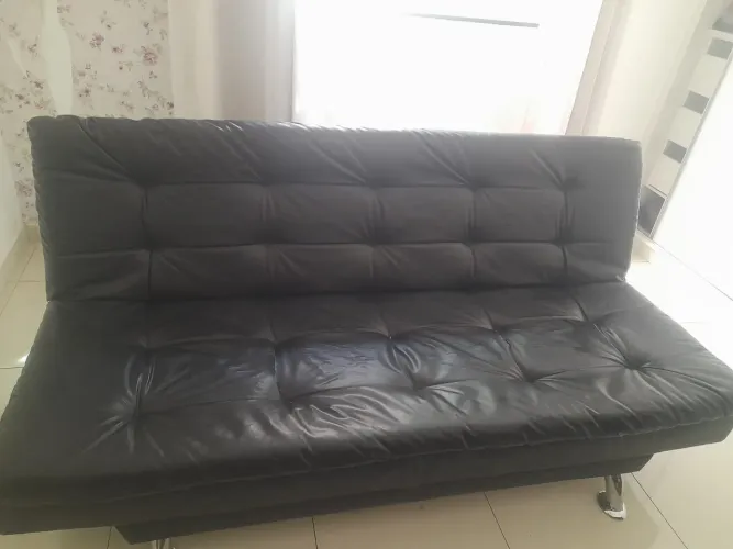 Sofá cama de couro
