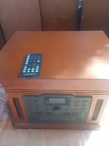 Para colecionador! Toca discos, cd e rádio.
