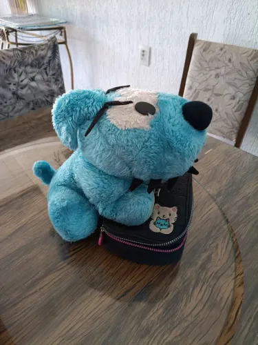 Cachorro pelúcia mônica e marrom