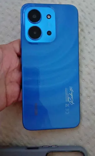 Celular redmi 15c acompanhado com as duas capinhas Caixa película fone de ouvido