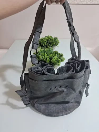 Bolsa da john john esticou saco