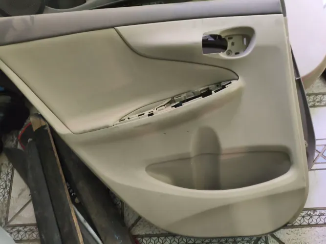 Forro de porta Corolla seg