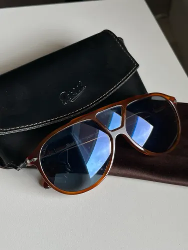 Óculos de sol Persol 3217-S Terra Di Siena com lente azul