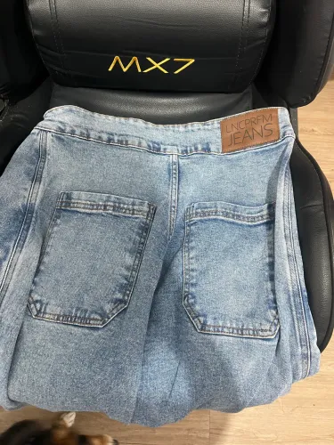 Calça jeans lança perfume tamanho 38