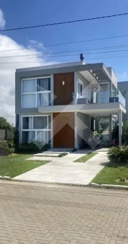 Casa em condomínio para comprar em Eldorado do Sul com 4 quartos (2 suítes)