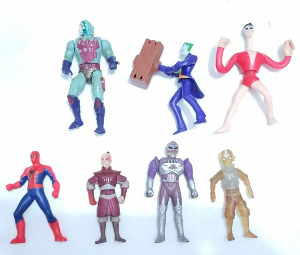 Lote 7 Bonecos de ação motu esqueleto aranha coringa acatar elastico Heróis e Vilões 