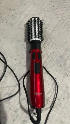 Escova modeladora giratória