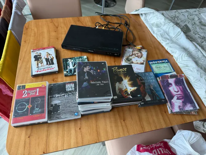 Tudo isso de DVD?s show, e filmes por 100 reais maioria originais