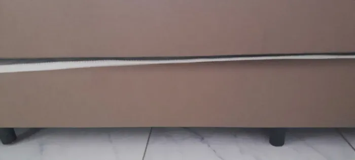 Colchão de solteiro e cama auxiliar.