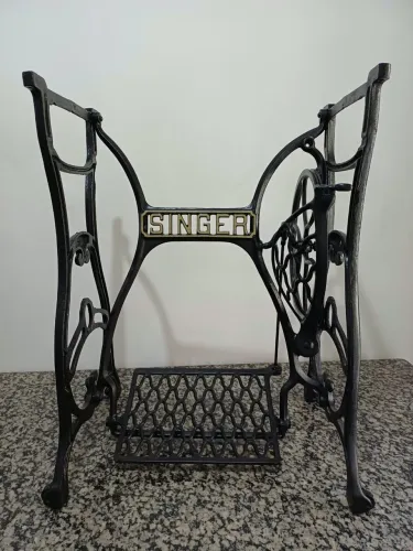 Pé antigo de máquina de costura Singer
