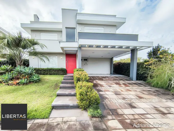 ALPHAVILLE PORTO ALEGRE | CASA COM FUNDOS PARA APP E ÁREA EXTERNA COMPLETA