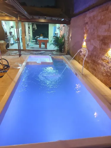 Espaço com piscina a venda