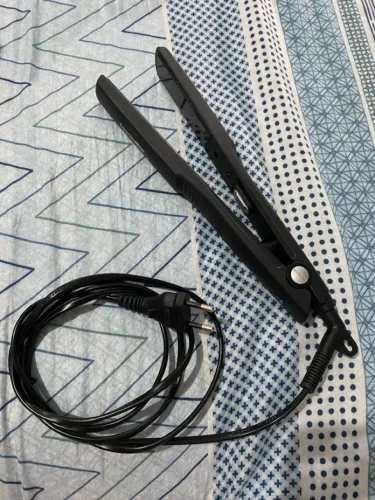 Prancha de cabelo Mondial bivolt 