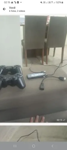 Aparelho de vídeo game com vários jogos.