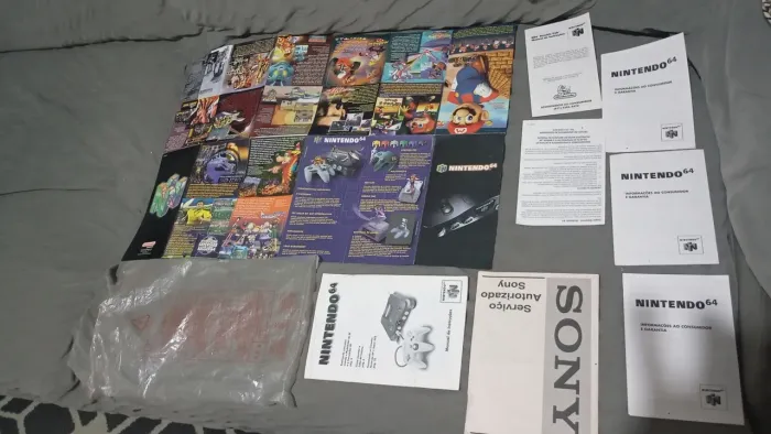 Manuais e poster Nintendo 64 original e manual da Sony <br>$300+frete