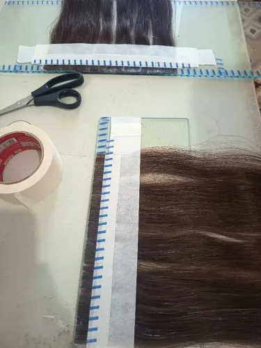 Tecimento de mega hair em tela adesiva 