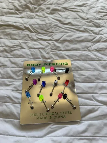 Piercing aço cirúrgico transversal dado