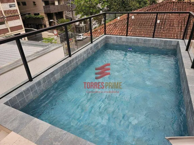 Casa na quadra da praia com piscina para alugar