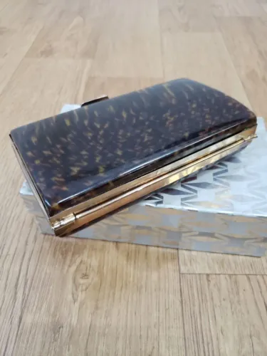 Bolsa Clutch Vintage Anos 70 - Elegância que atravessa décadas!